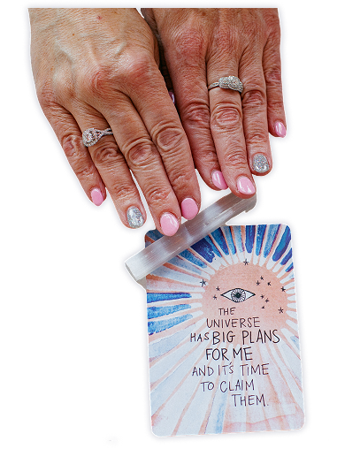 Hands with oracle card